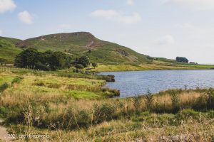 Embsay reservoir with Embsay Crag in the background. Embsay Moor – Wild Camp #016