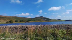 Embsay reservoir with Embsay Crag in the background. Embsay Moor – Wild Camp #016